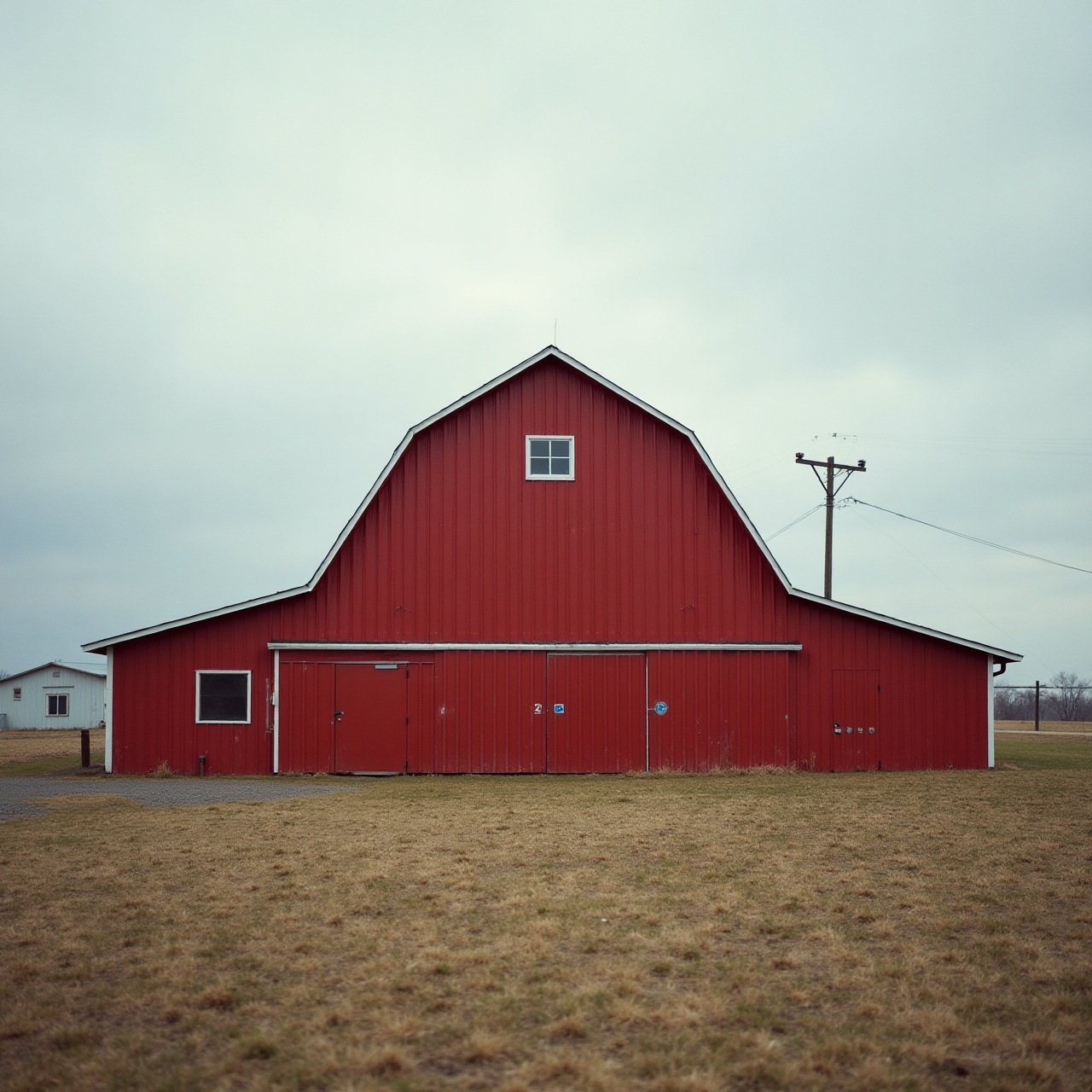 a red barn under open sky
